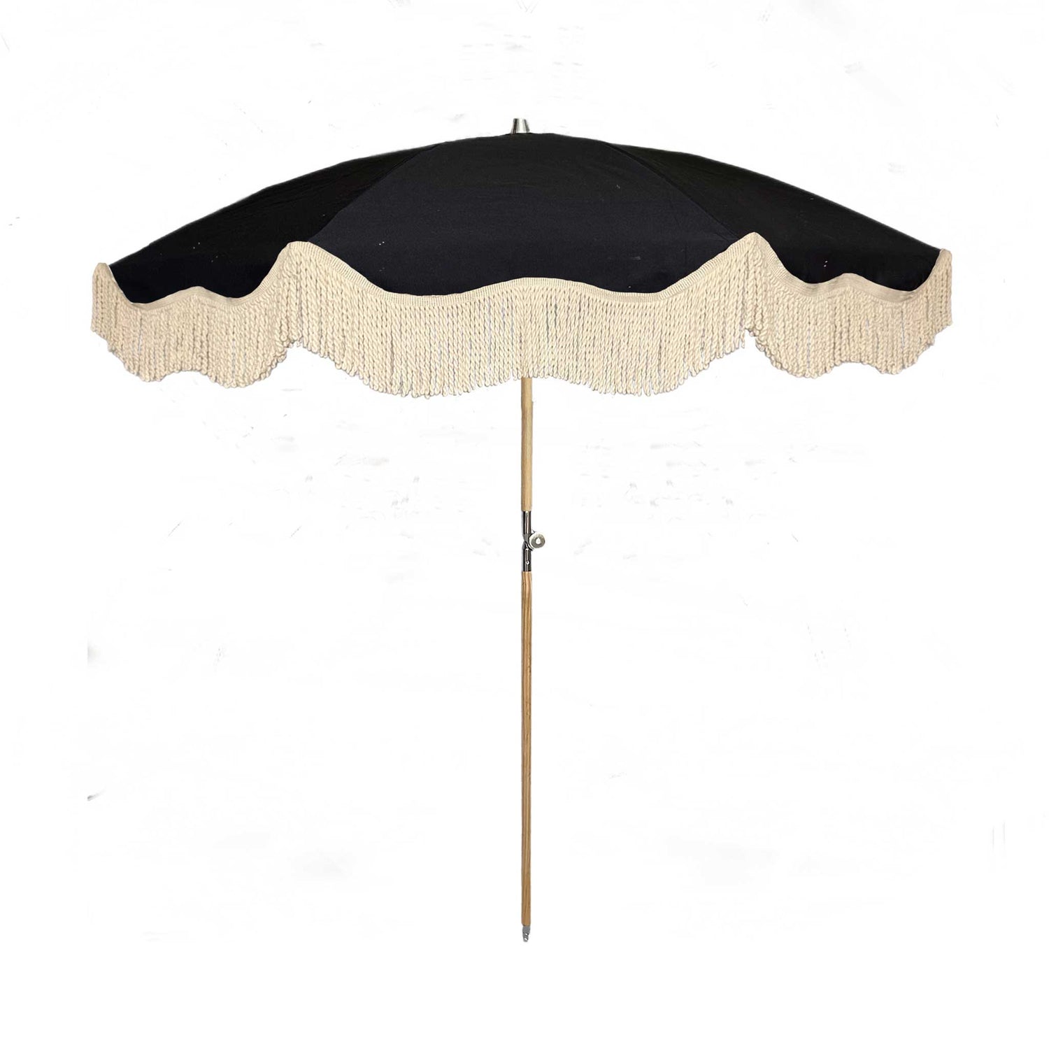 The Dorothy luxury black parasol with natural cotton fringing, wooden frame pole, adjustable positioning, collapsible design, signature logo panel, and matching carry bag.