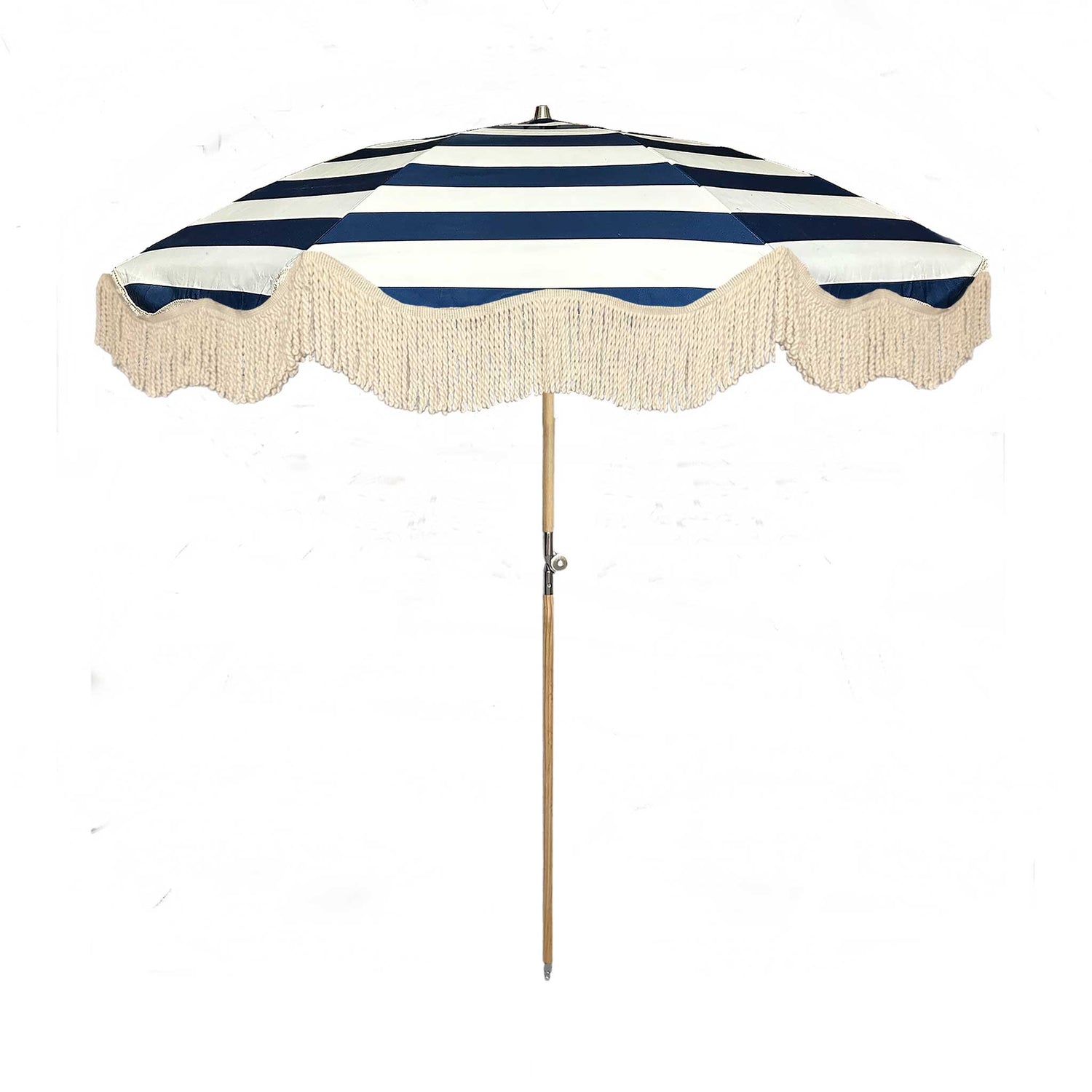 The Hugo timeless chic parasol with natural cotton fringing, wooden frame pole, adjustable positioning, collapsible design, and matching canvas carry bag.