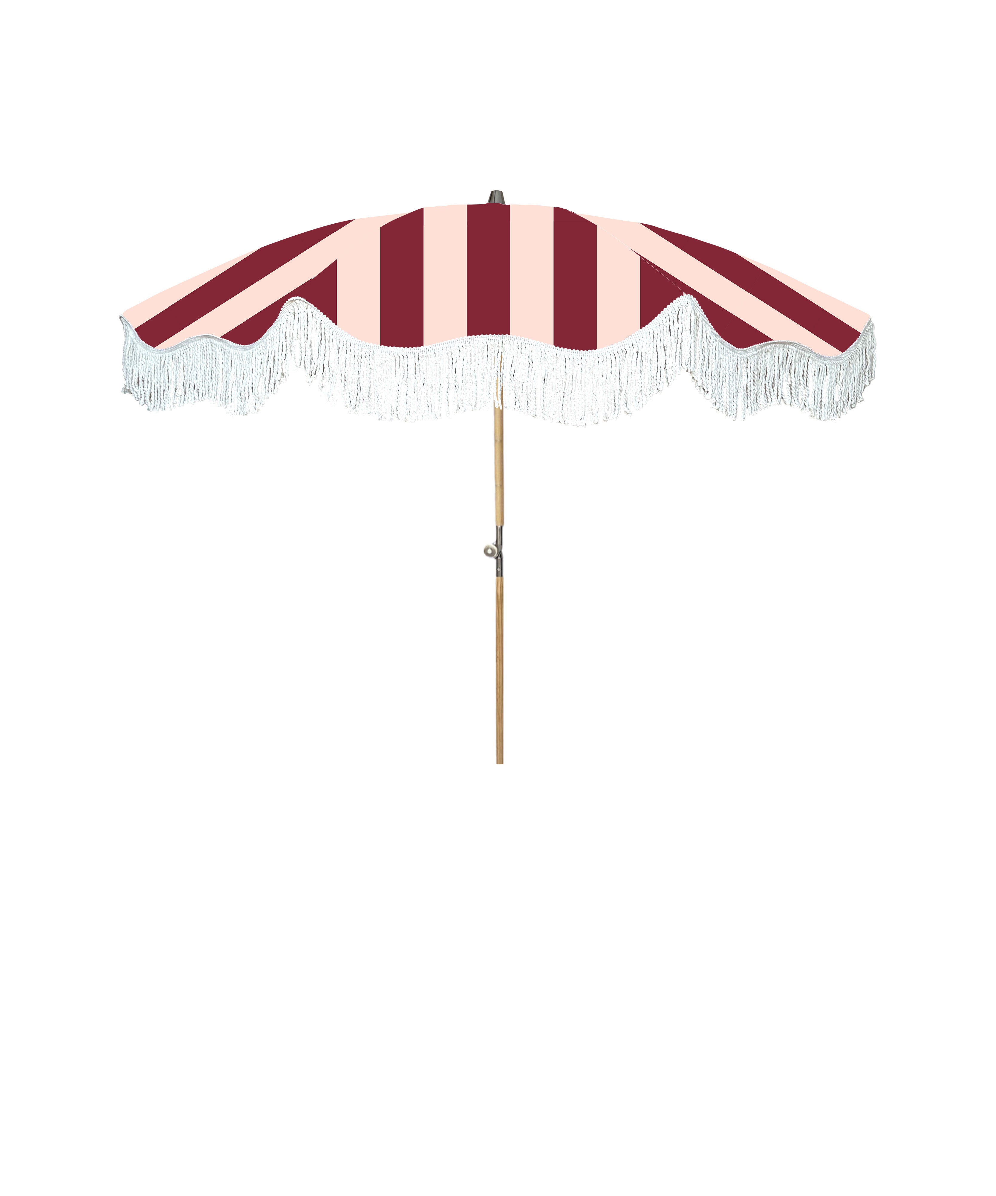 Mini Agnes parasol with natural cotton fringing, wooden frame, adjustable positioning, perfect for children and park outings, includes matching carry bag.