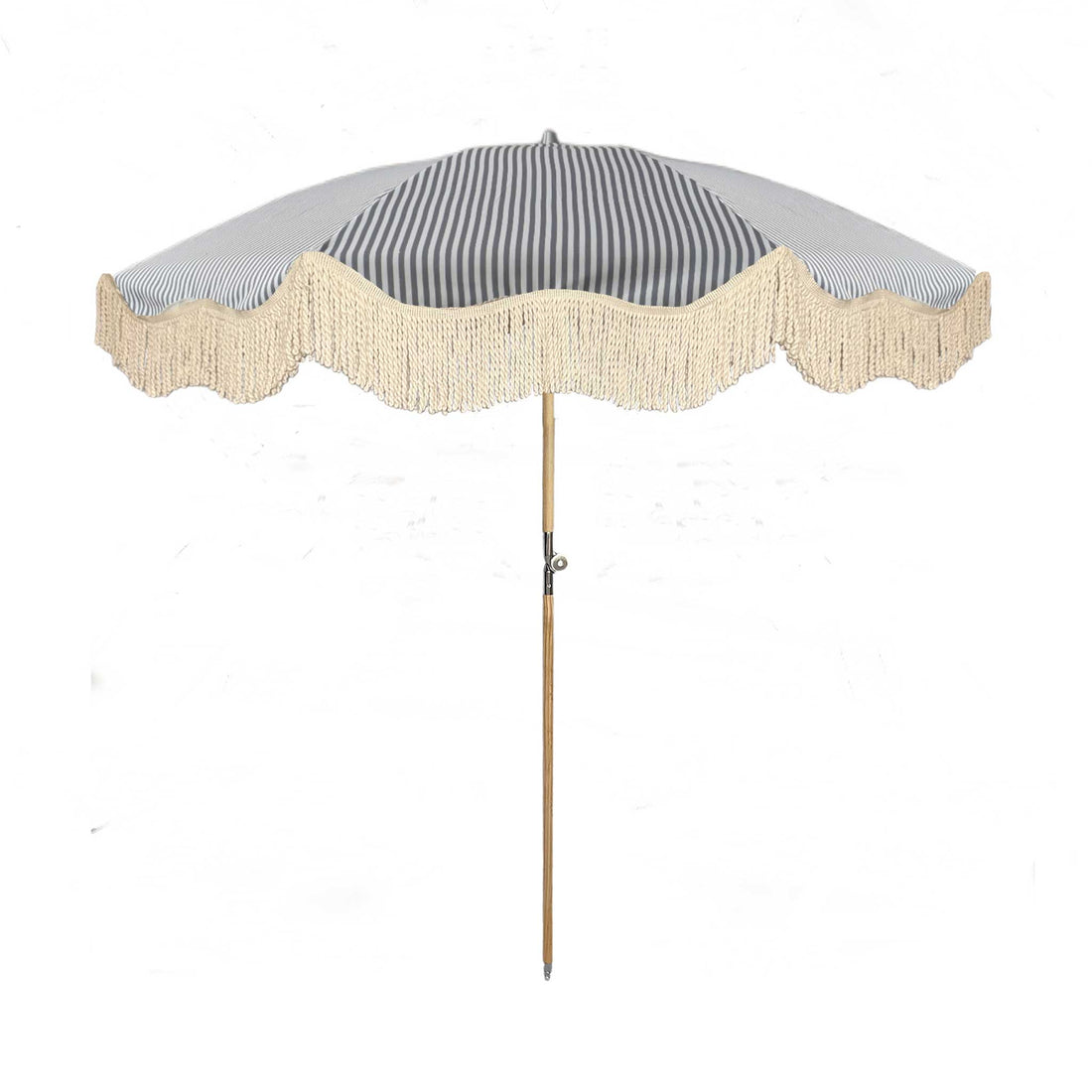 The Betty timeless chic parasol with natural cotton fringing, wooden frame pole, adjustable positioning, collapsible design, and matching canvas carry bag.