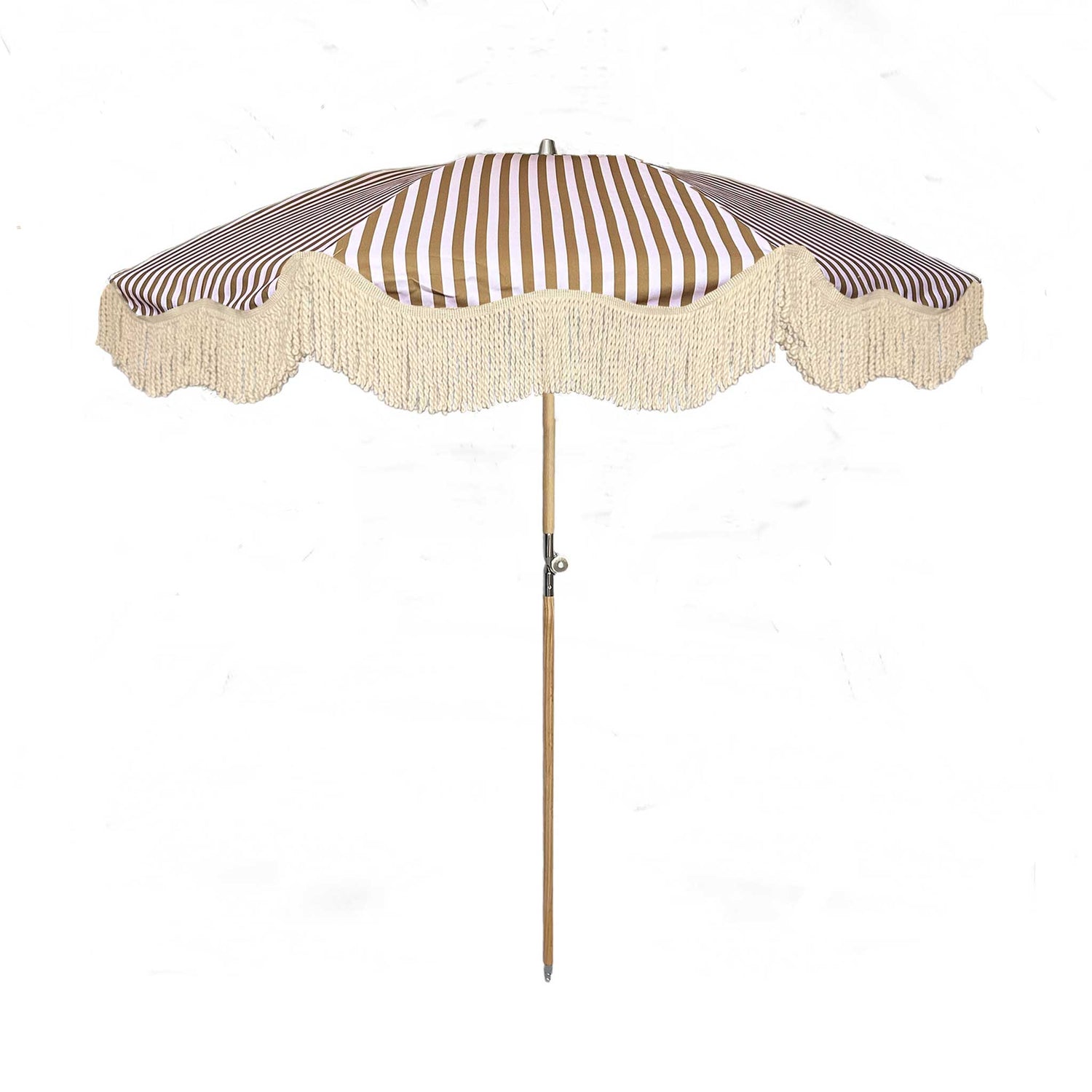 The Gigi luxury pink and camel striped parasol with natural cotton fringing, wooden frame pole, adjustable positioning, collapsible design, and matching carry bag.