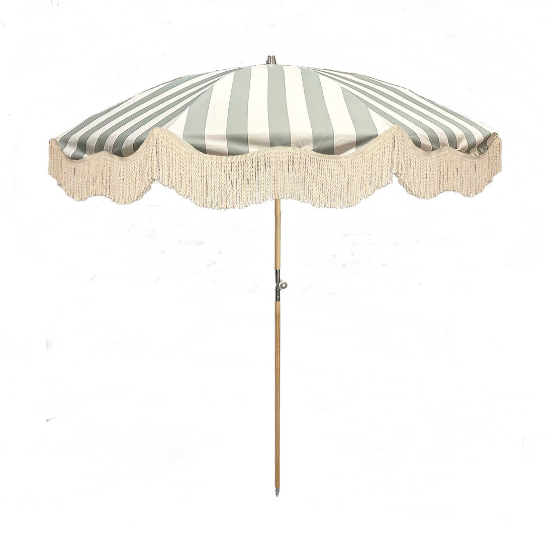 The Clara pastel green and white striped parasol with natural cotton fringing, adjustable wooden frame pole, collapsible design, and matching canvas carry bag.