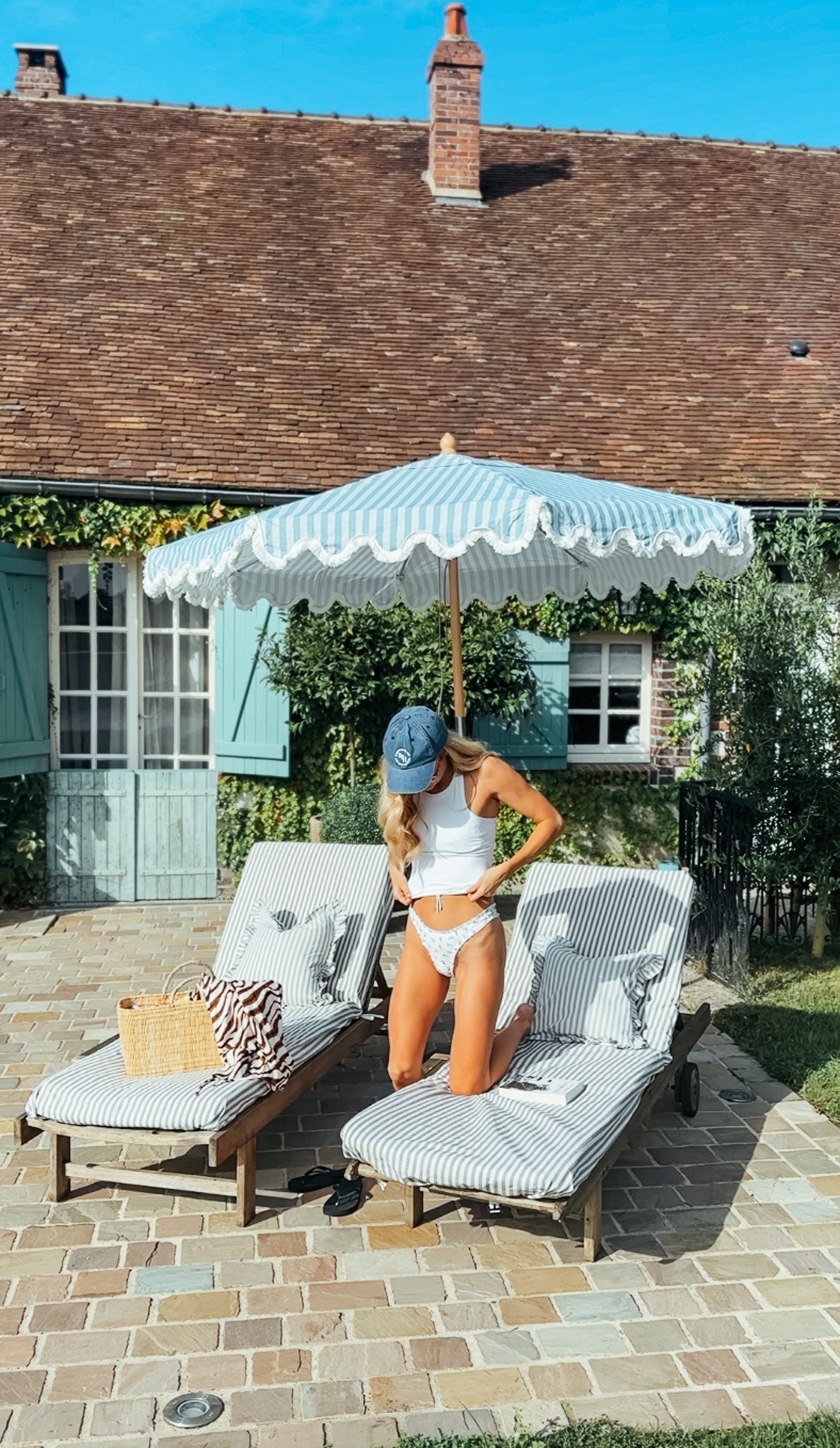 Rupert blue striped parasol with wavy fringed edge and durable frame, perfect for garden or patio. Patio sun beds umbrella.