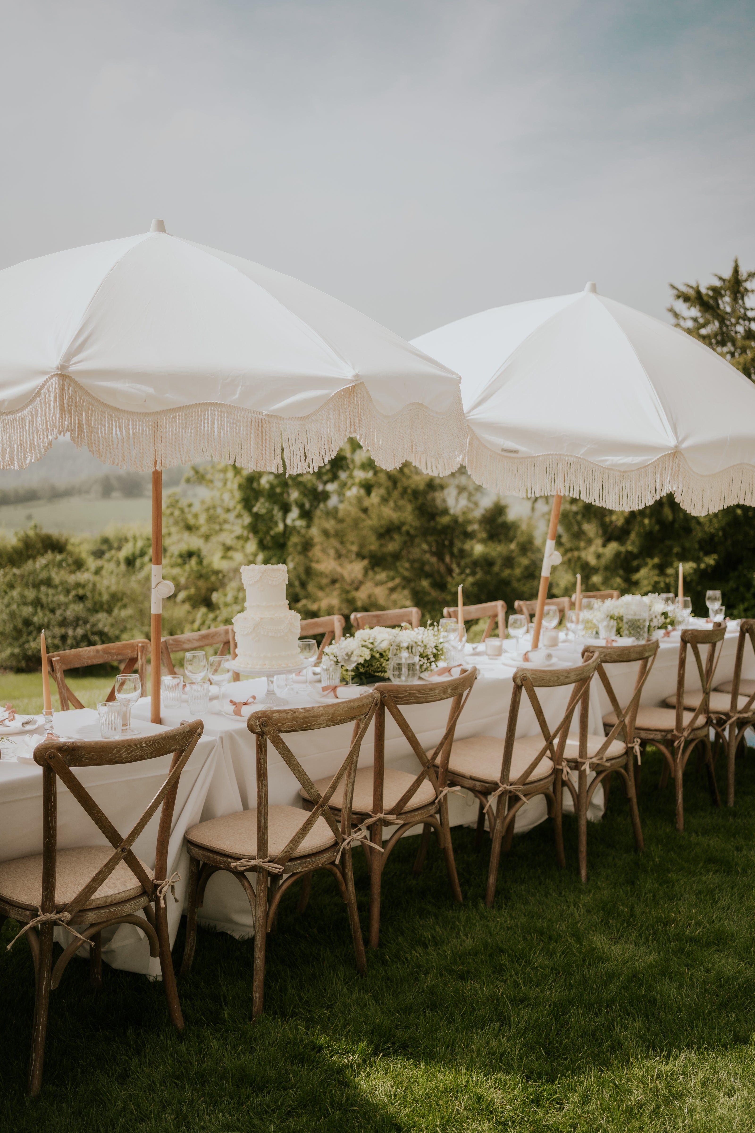 Tablescape parasol fringing wedding.