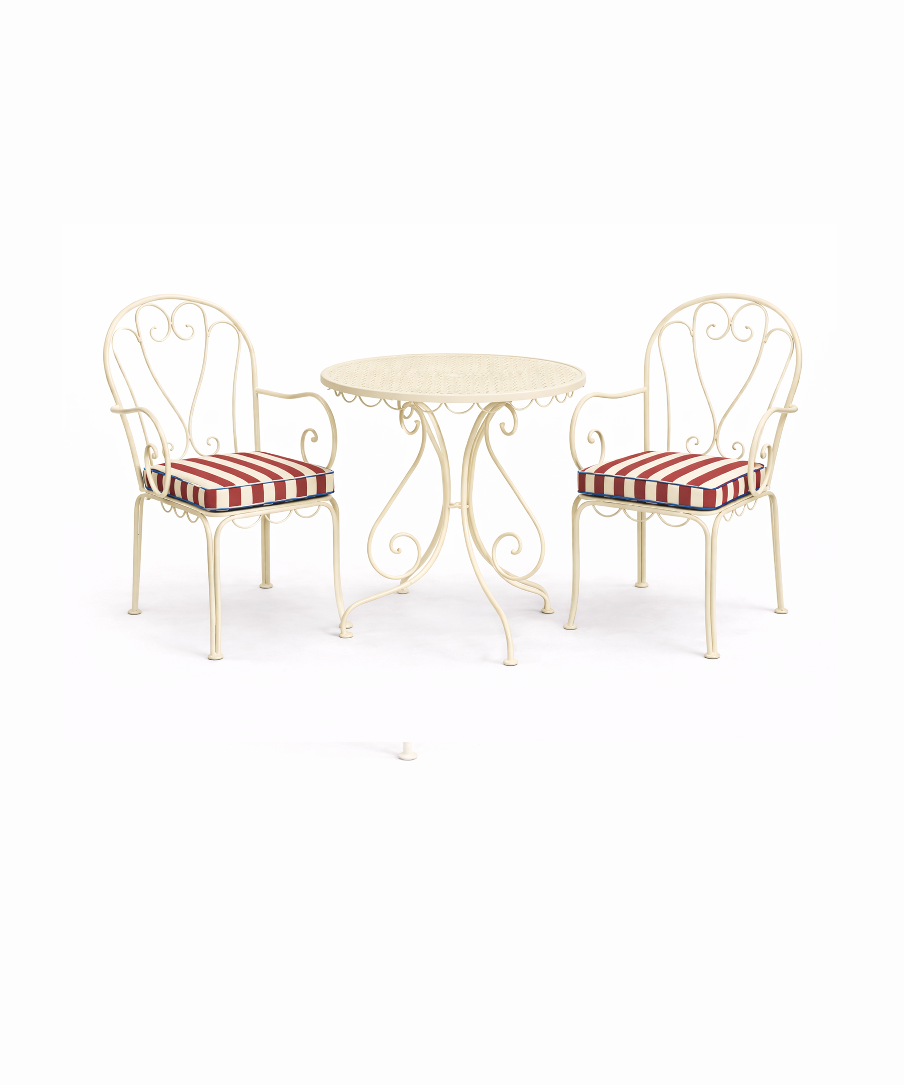 Red stripe outdoor seat cushion on cream metal garden chair