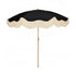 The Dorothy luxury black parasol with natural cotton fringing, wooden frame pole, adjustable positioning, collapsible design, signature logo panel, and matching carry bag.