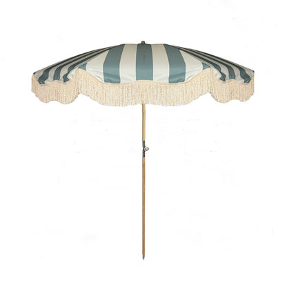 Pastel blue and cream striped parasol with natural cotton fringing, featuring an authentic wooden frame, adjustable positioning, and a collapsible design, perfect for gardens and patios